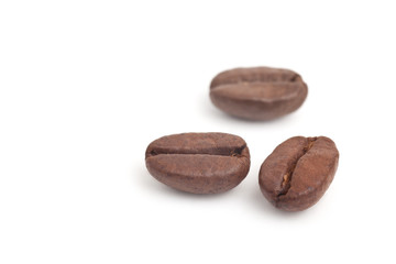 Coffee beans close up in isolated white background