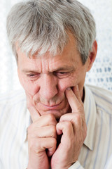 Portrait of a sad senior man