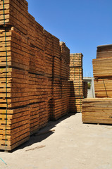 Wood rails in warehouse territory.