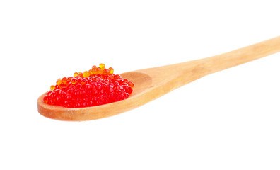 Red caviar on spoon isolated on white