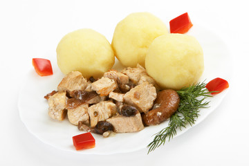Roast turkey with mushrooms and potato balls