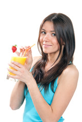 beautiful woman drinking orange juice cocktail with strawberry