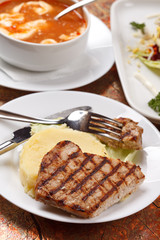 grilled steak with potatoes