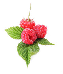 Raspberry with green leaves isolated on white