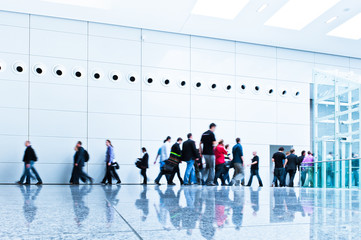 trade fair hall with blurred people