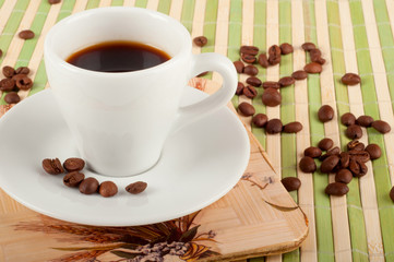 Coffee cup and coffee beans
