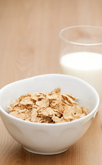 breakfast cereal and glass of milk