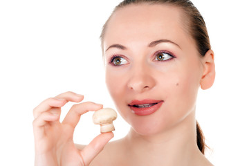 Female model with a champignon mushroom