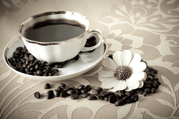 cup of coffee with beans