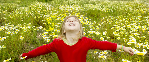 blond girl open arms spring meadow daisy flowers