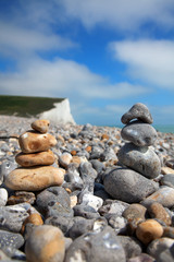Two stacks fo pebble stones on beach