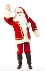 pere noel faisant un signe de la main