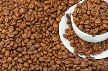 White cup with coffee grains