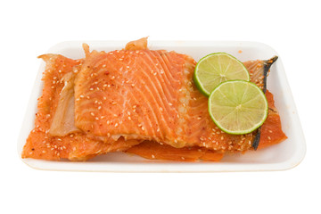 salmon with green lemon. isolated on white background.