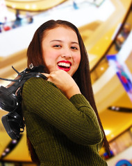 Smiling Teenager in a Shopping Center