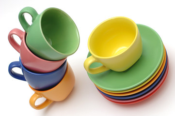 Colored coffee cups and dishes