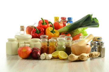 Spices and vegetables on kitchen table