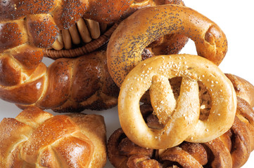 rolls and other grain products on a white background