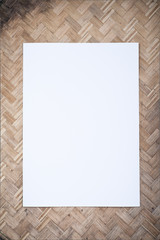 White blank note paper hang on weave background
