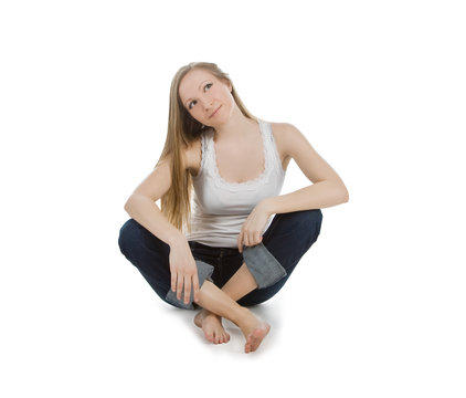 bright picture of happy and carefree teenage girl sitting on the