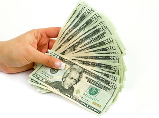 Female hands holding 20 dollar banknotes