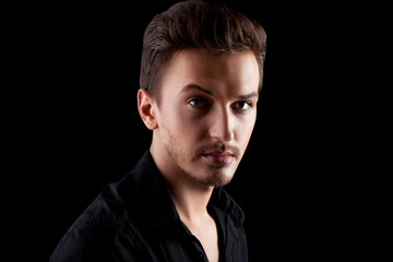 Obraz premium Young man's portrait. Close-up face.