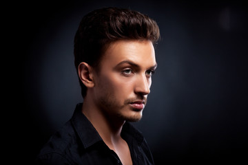 Obraz premium Young man's portrait. Close-up face.