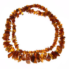 Amber necklace on white background