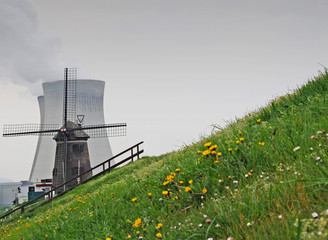 Old windmill with nuclear cooling towers, Antwerp