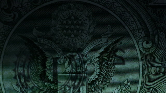 The banknote dollar is scanned. Close-up.