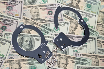 Dollar Currency notes with handcuffs