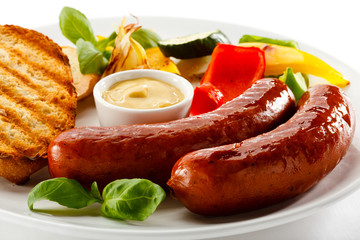 Grilled sausages and vegetables