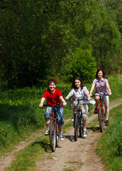 Family riding bikes