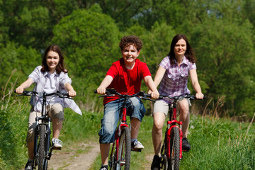 Family riding bikes