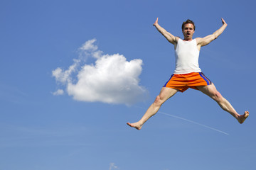 mann springt in die luft