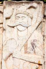 Soldier bas-relief killing a bist