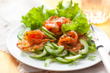 Potato rosti with smoked salmon and cucumber salad