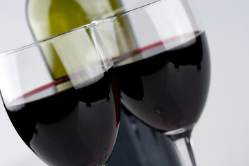 Two Glasses of Red Wine with Bottle