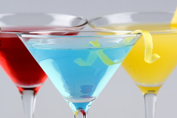 Tropical Martini Drinks with fruit and garnish