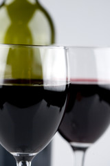 Glass of Red Wine with Bottle