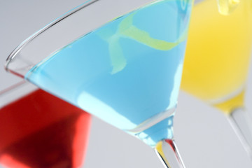 Tropical Martini Drinks with fruit and garnish