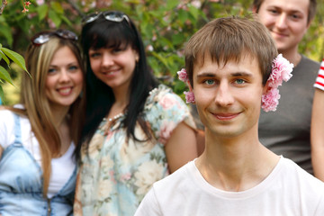 Fototapeta premium student happy funny with flowers outdoor