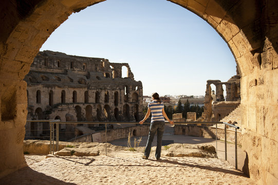 Woman watching old ruins