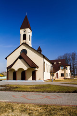 Fototapeta na wymiar The Catholic church located in countryside in Belarus