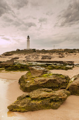 Fototapeta premium Lightouse & Rocks