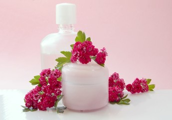 cosmetics and small roses