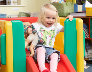 Young girl playing with toys