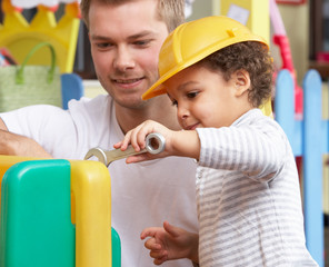 Man with children playing together