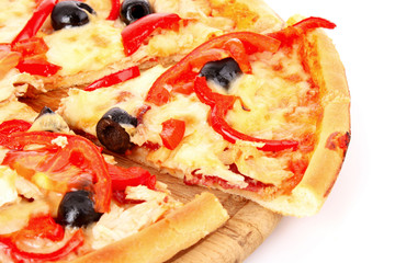 Pizza with olives and tomatoes closeup