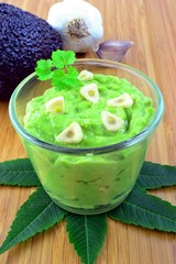 Haas avocado garlic guacamole dip in glass